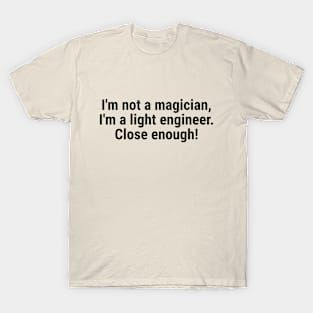 I'm not a magician, I'm a light engineer – close enough! Black T-Shirt